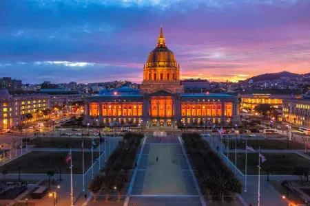 City Hall illuminated in orange light